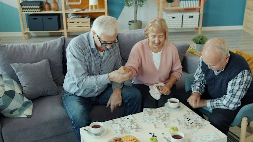 Three residents playing a game together