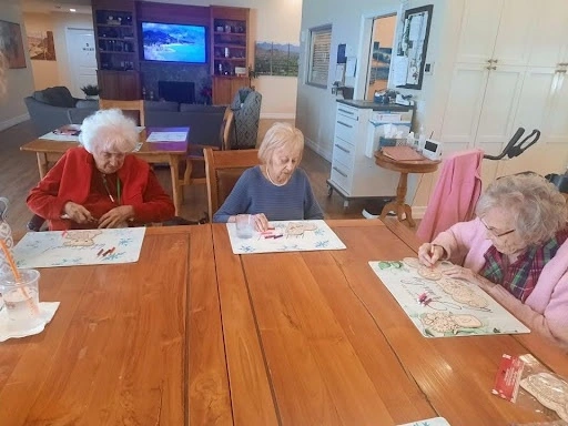 Residents enjoying a fun afternoon making arts