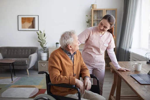 Old man smiling at caregiver